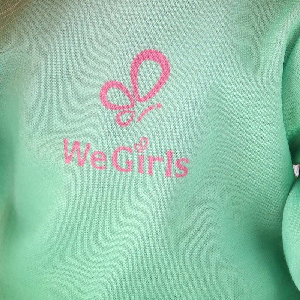 Detail shot of Anna doll's teal t-shirt, showcasing the soft fabric texture and casual sleeve design.