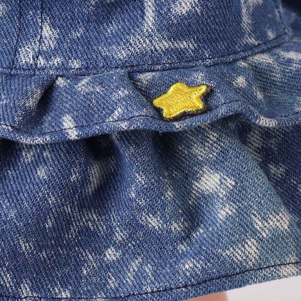 Close-up detail of Wanru doll's denim cake-layer skirt, highlighting the tiered design inspired by pastries.