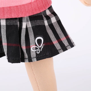 Detail of the houndstooth pattern on Akiko doll's removable pleated skirt