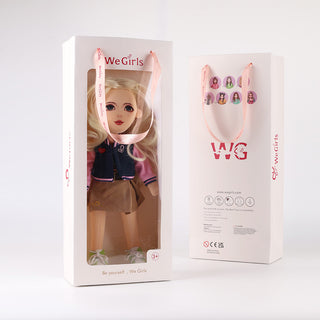 Lucy doll presented in premium white gift tote packaging - elegant presentation