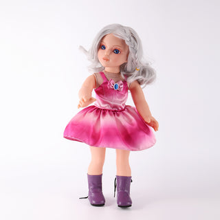 Side profile of Natasha doll showcasing the silhouette of her satin puff dress