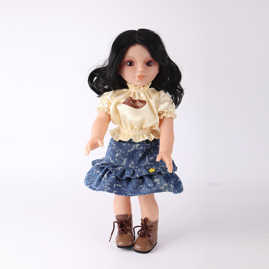 Front view of WeGirls Pastry Chef Wanru doll with black curly hair, wearing a sweet yellow top and denim cake-layer skirt.
