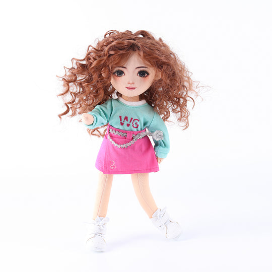 WeGirls Yufei doll in lively playful pose wearing mint green tee and pink pleated skirt"